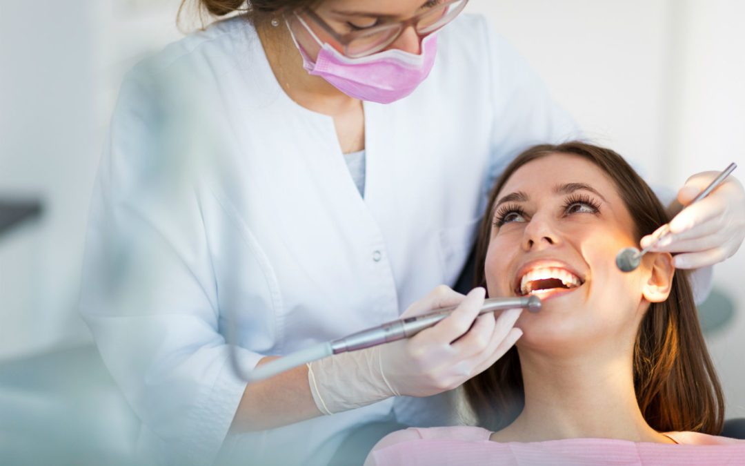 Dentist and Patient Dentist and Patient